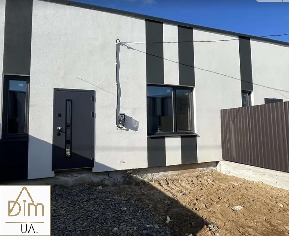 Фасад одноповерхового таунхауса в Якушинцях